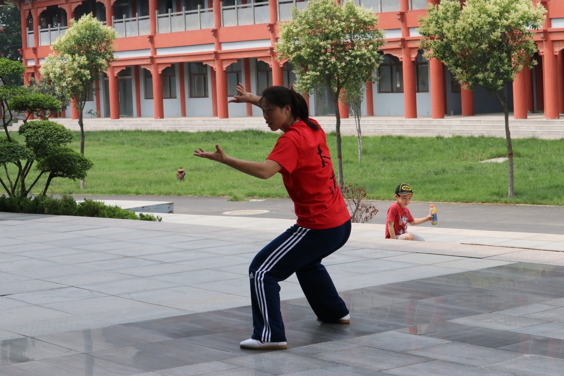 Master Chen Huixian demonstrating spiraling arm movement in Chenjiagou